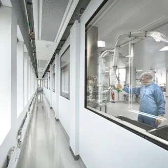 A man working in a pharmaceutical production facility